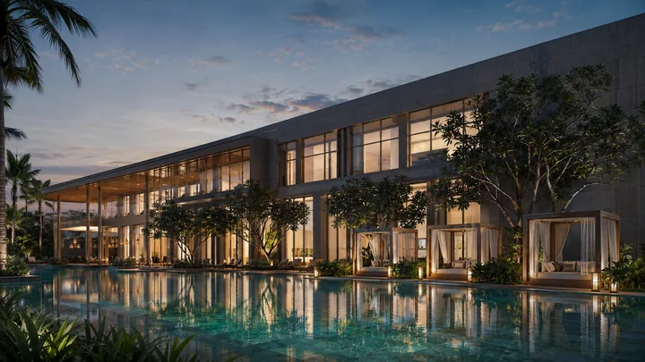 Godrej Soukya Road clubhouse exterior with reflective swimming pool at twilight
